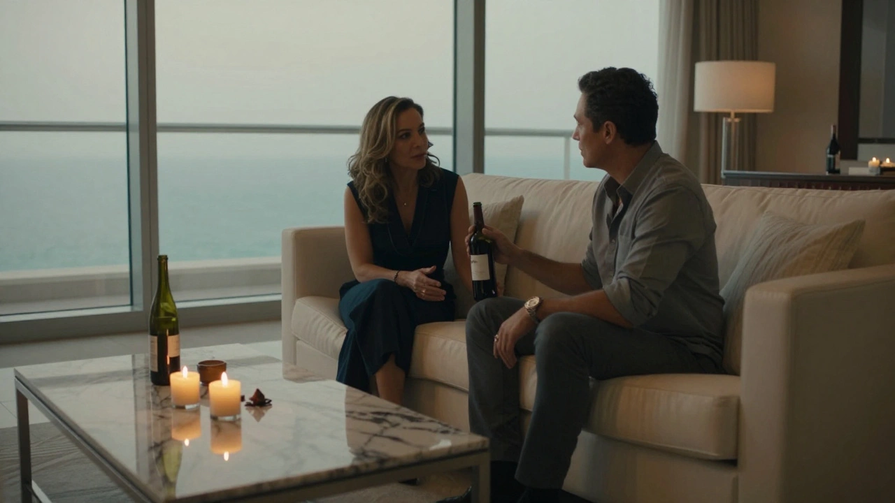 A mature woman and client sharing quiet conversation in a luxurious penthouse suite with candlelight.